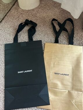 Saint Laurent Black and Gold Shopping Tote Bags